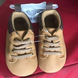Carter’s tan and brown,0-3 months boots,never worn, still new with tag